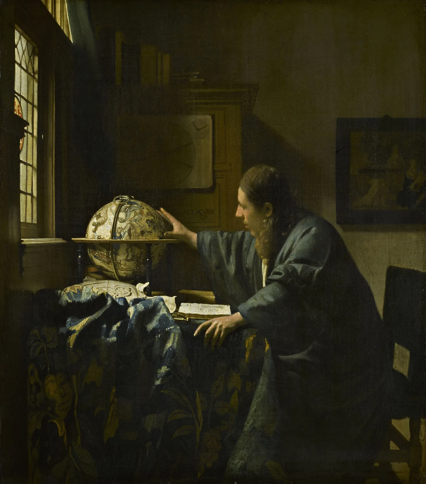 A scholar beside a window reaches toward a celestial globe, with an open book on the table.
